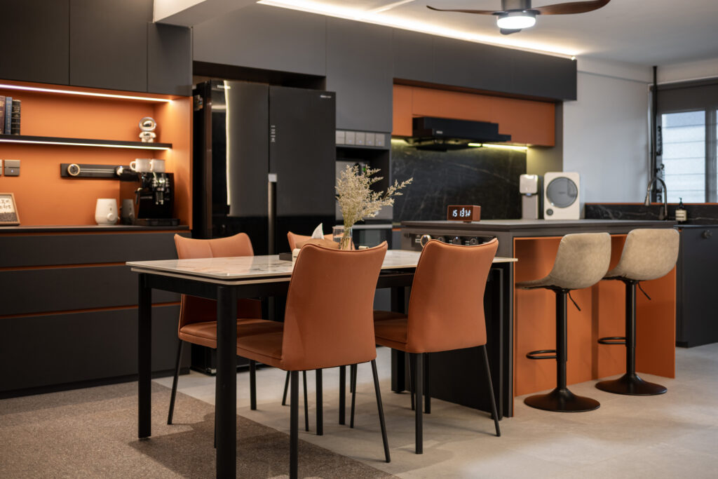 Integrated kitchen island and dining table setup designed for family gatherings.